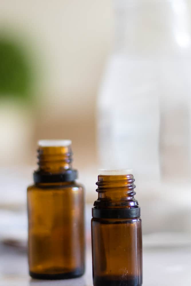 Spearmint and wintergreen oil bottles for flavoring mouthwash.

