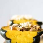 acorn squash with sausage and cheese.