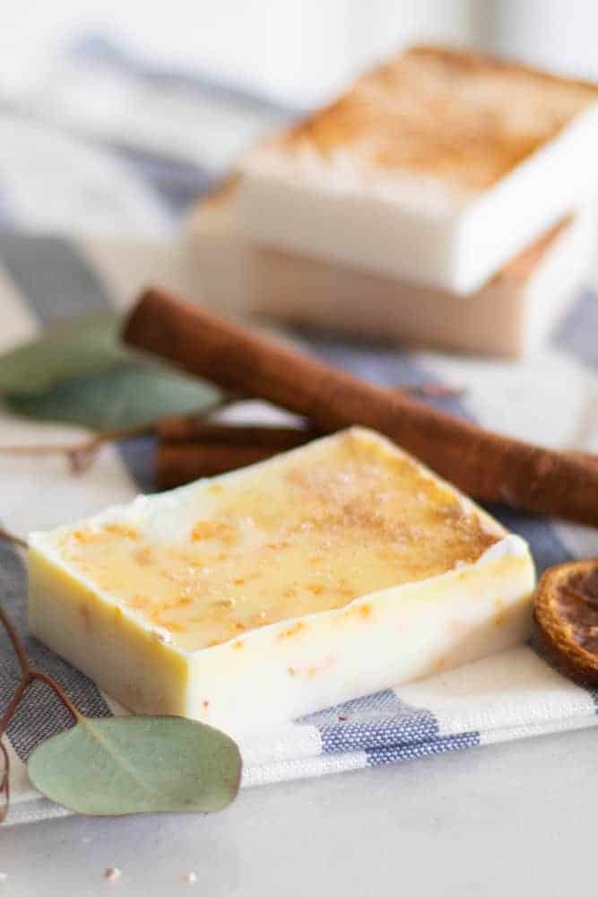 Cinnamon stick Christmas soap recipe with a hint of orange coloring.
