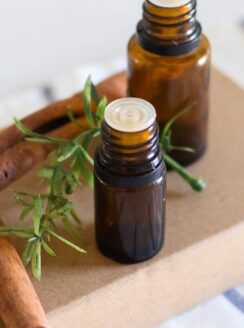 amber colored essential oil bottles on cardboard box