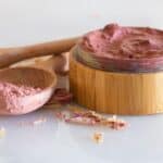 rose clay face mask in wooden container