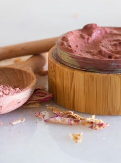 rose clay face mask in wooden container