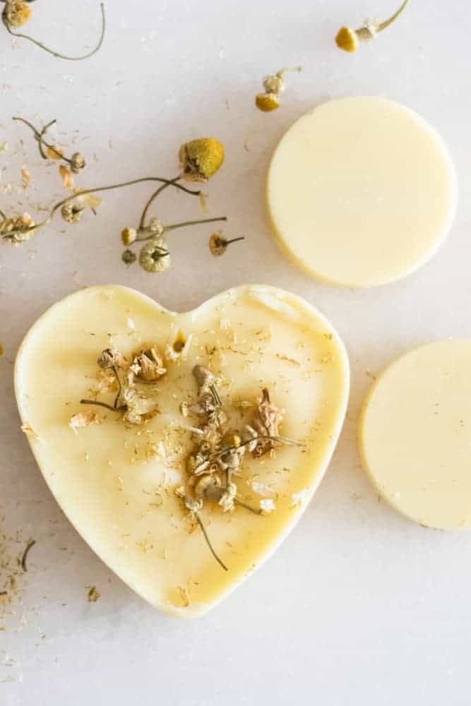 beeswax heart shaped air freshener on white marble