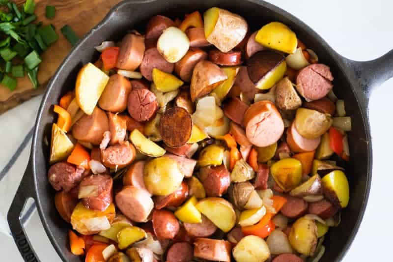 cast iron skillet with potatoes and sausage meal