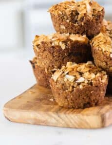 sugar free applesauce muffins on wooden cutting board.