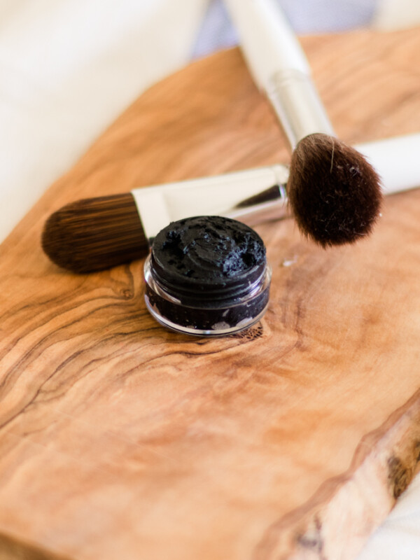 Homemade eyeliner in small glass jar.