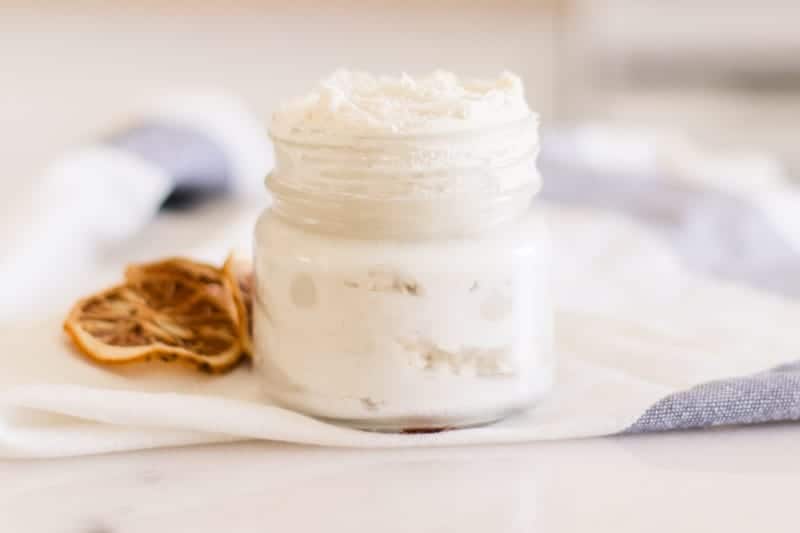 Hand cream in small mason jar.