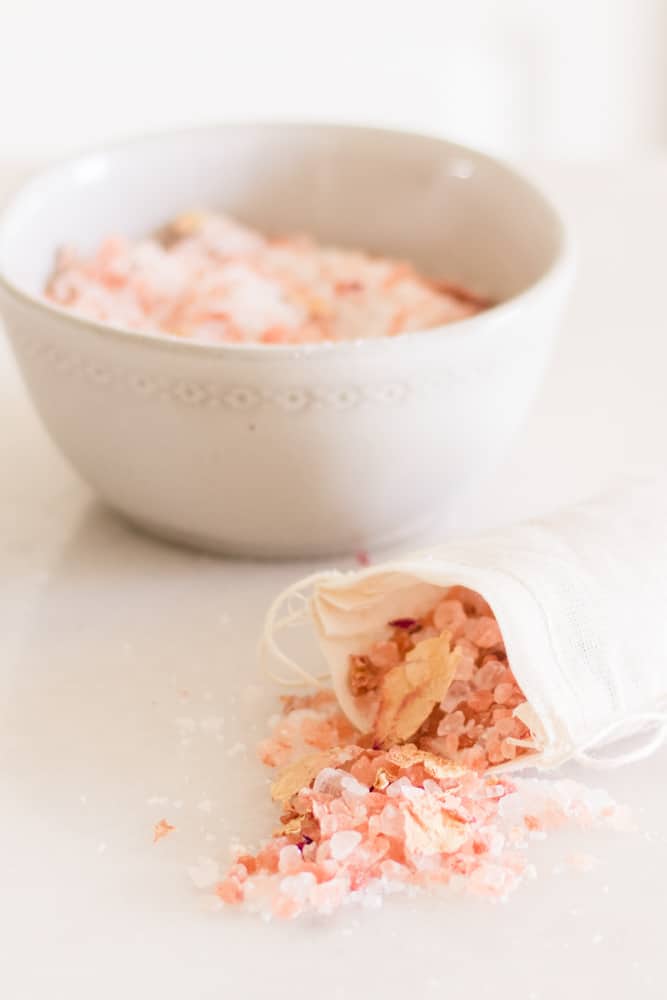 Rose bath salts in small muslin bag.