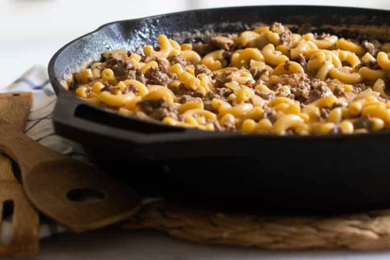 Cast iron skillet of hamburger helper.