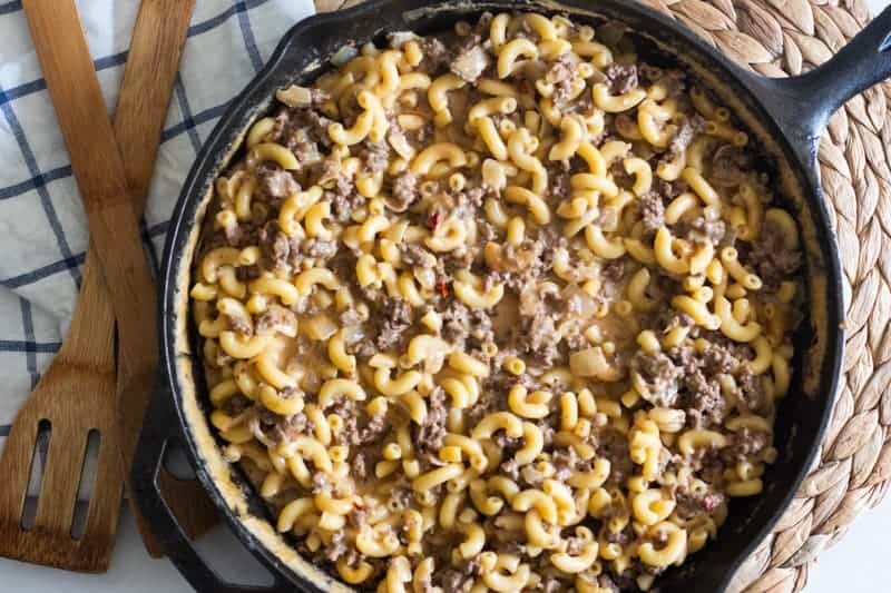 Cast iron skillet of gluten free hamburger helper.