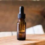 Vitamin E oil in a glass dropper bottle.