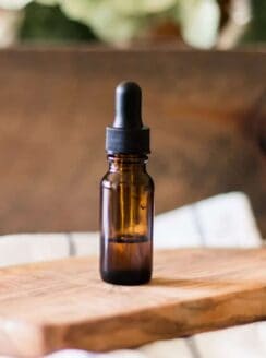 Vitamin E oil in a glass dropper bottle.