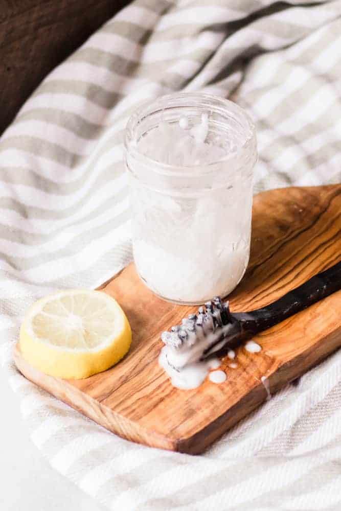 Grout cleaner with baking soda in mason jar.