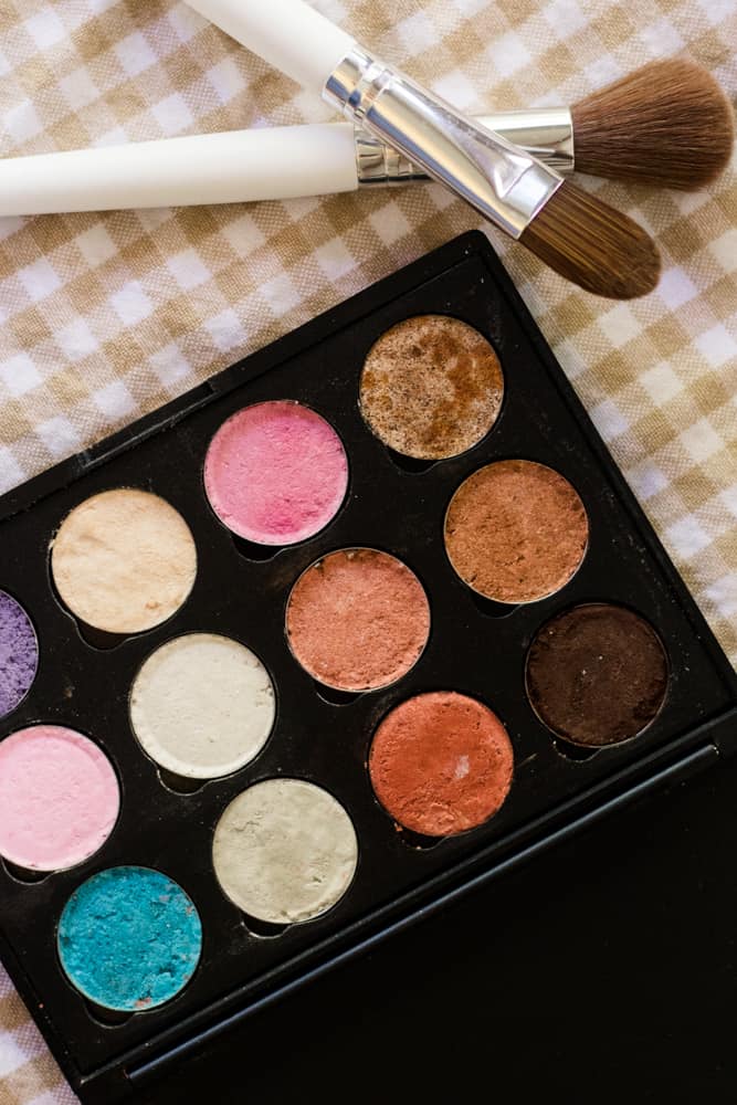 Homemade eyeshadow palette with multiple colors.