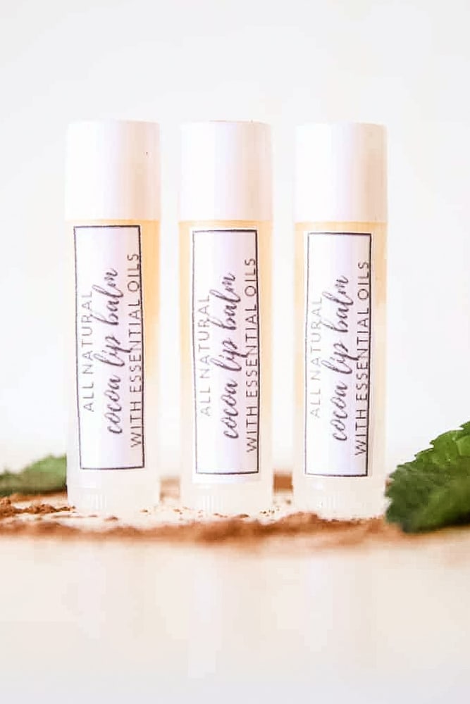 DIY lip balm in three reusable tubes with a homemade label. 
