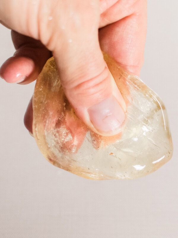 Sugar wax being formed to lay out on the skin.