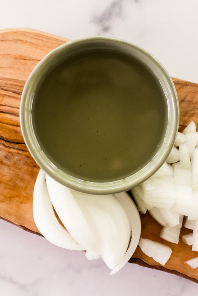 Onion oil with fresh sliced onions for the hair.