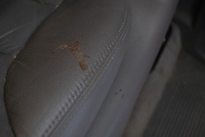 A stain on a leather car seat.