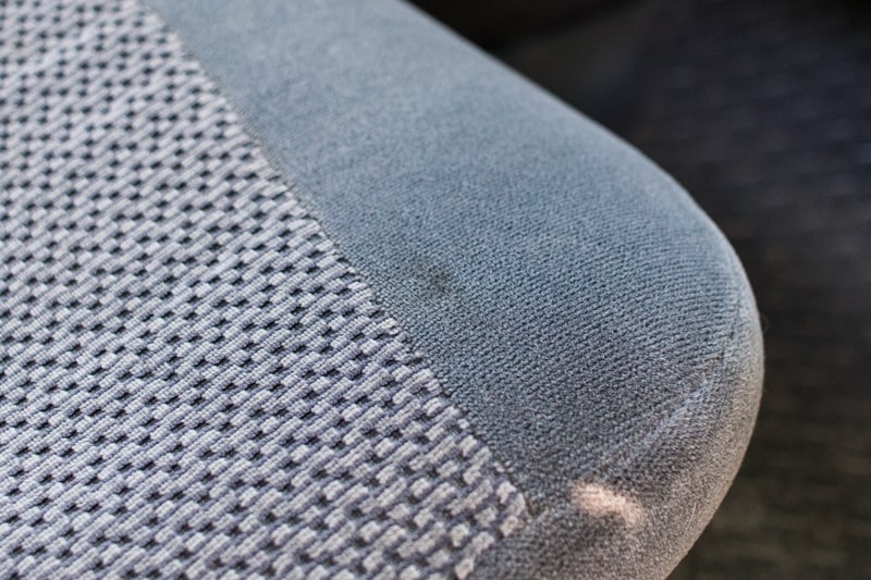 A car seat stain on cloth.