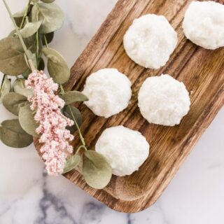 Homemade scented bath truffles with dried flowers.
