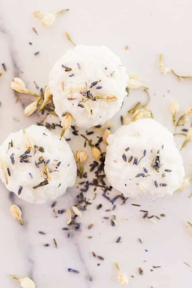 Bath truffles close up decorated with dried flowers.