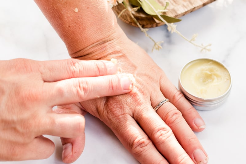 Lemon balm salve on the hands.