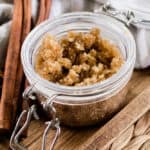 Pumpkin sugar scrub in a glass locking container.