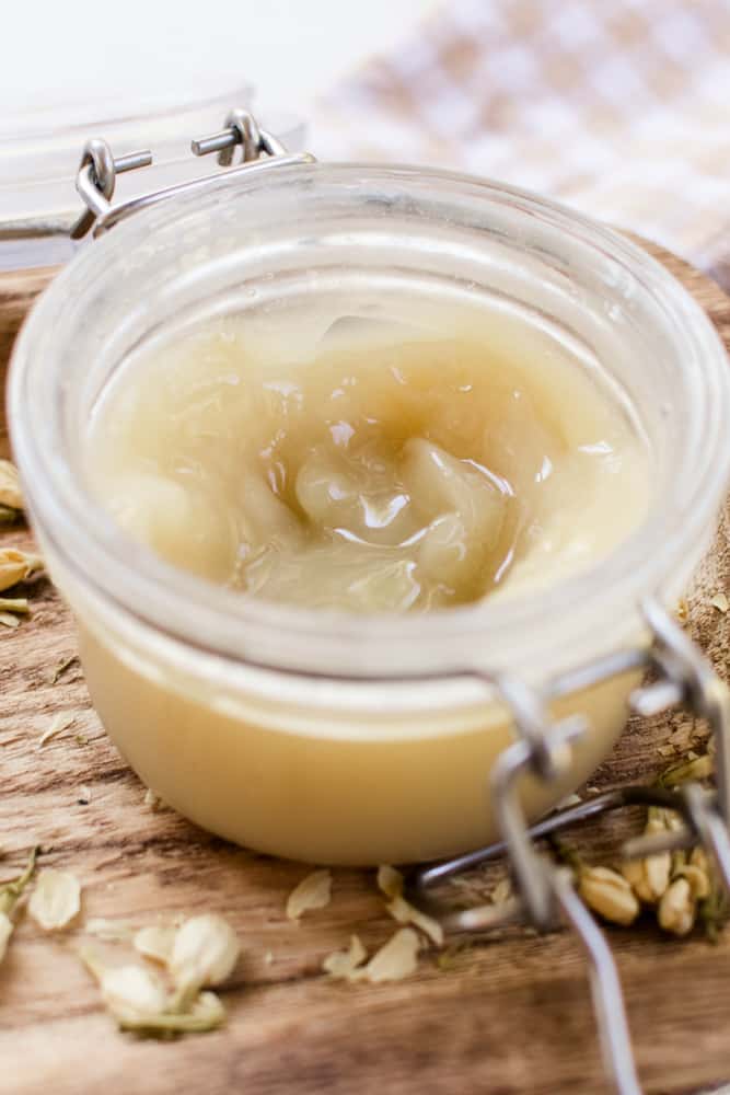 A close up jar of curl enhancing cream