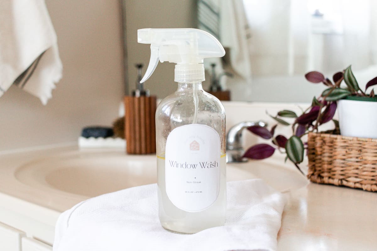 Homemade window cleaner in a glass bottle. 