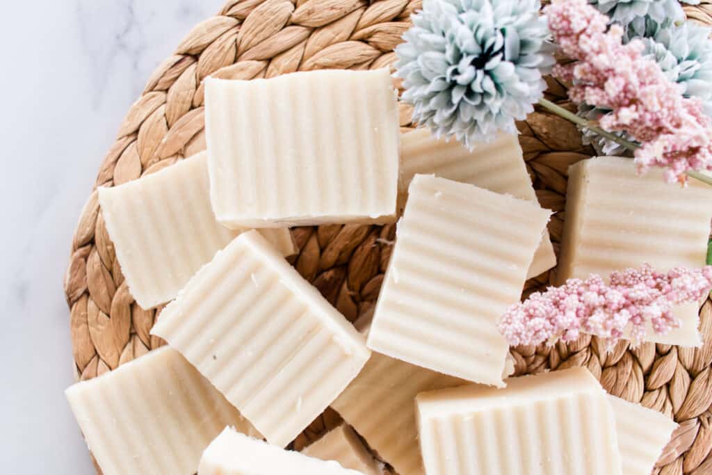 Beeswax soap bars on a rattan board. 