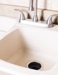 A clean white granite composite sink.
