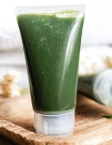 Gel face cleanser in a clear squeeze tube.
