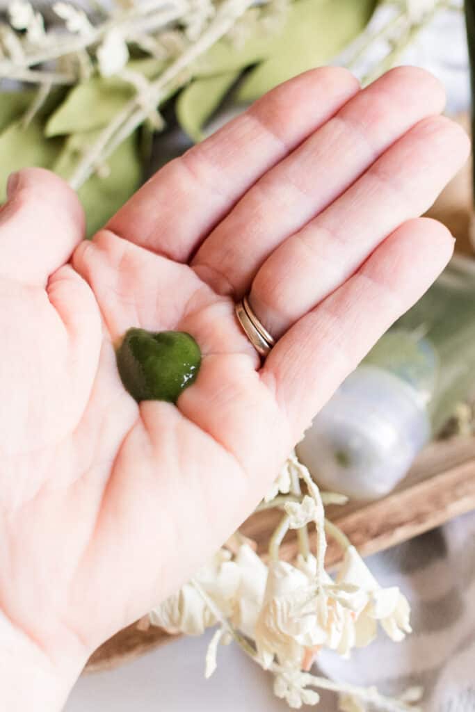 Homemade gel face cleanser with aloe vera gel on my hand.