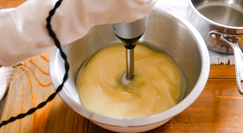 Bring cold process soap to trace with an immersion blender.