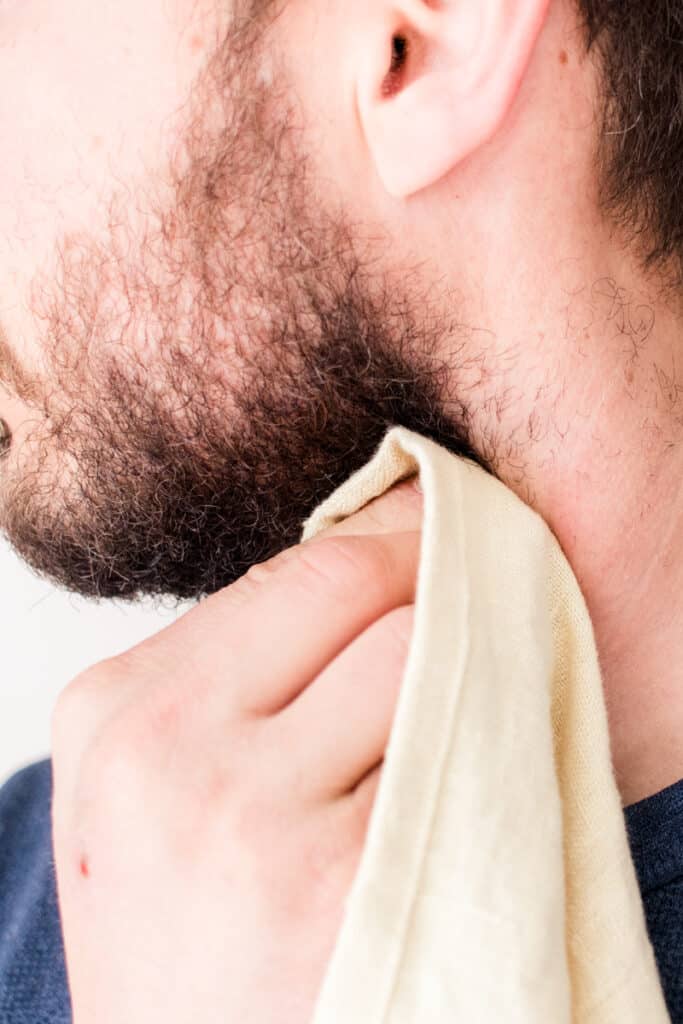 Rubbing tea tree oil on a ingrown hair to loosen it up.