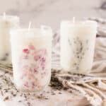 3 mason jar candles with dried flowers.