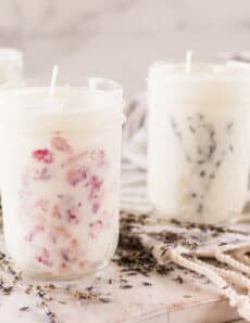 3 mason jar candles with dried flowers.