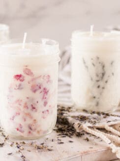 3 mason jar candles with dried flowers.