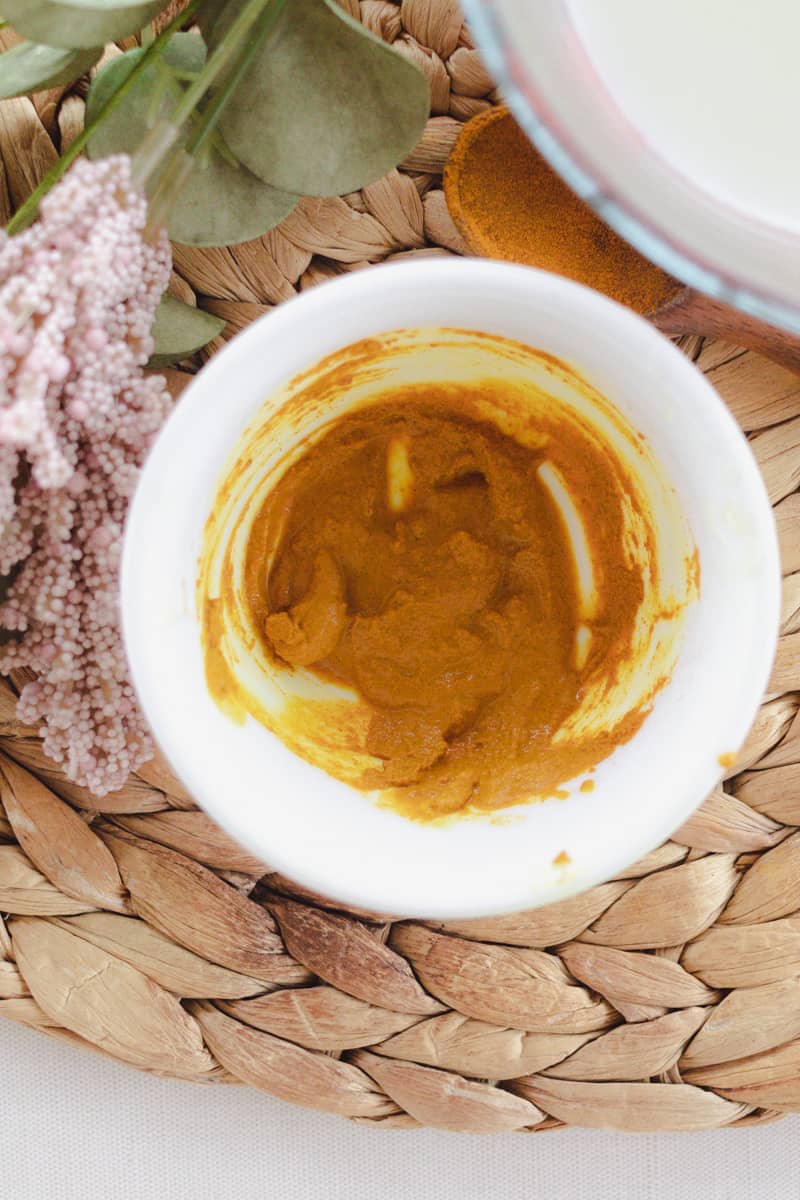 Turmeric eye mask in a small bowl.