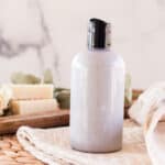 Hard water buildup shampoo in a reusable squeeze bottle.