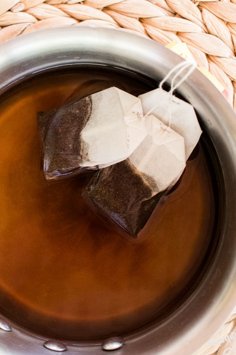 Black tea tea bags in water. 