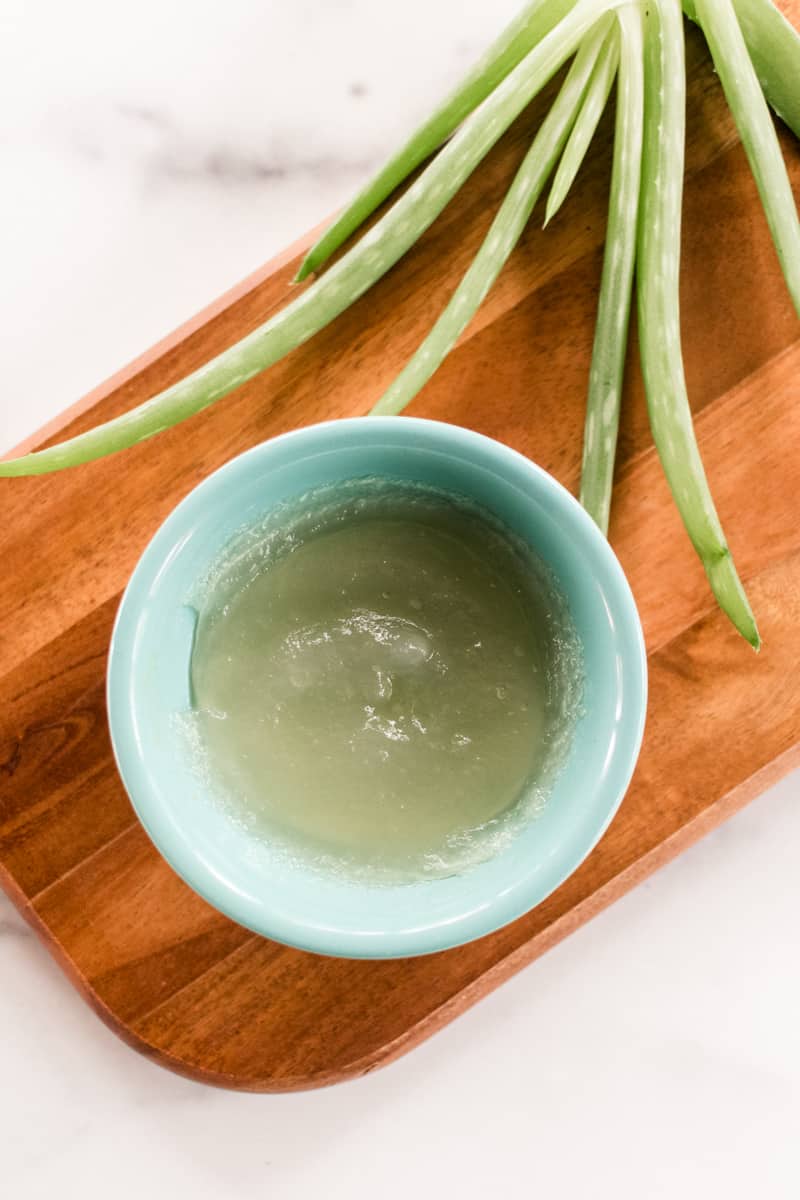 Aloe Vera gel on a wooden board. 