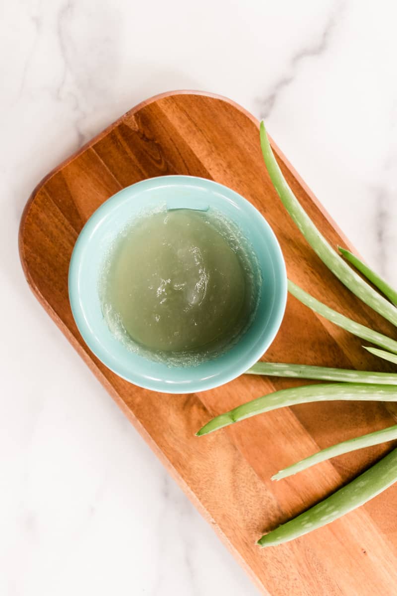 A bowl of fresh squeezed aloe vera gel ready to apply to the face.