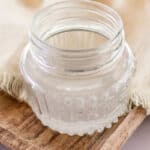 A small jar of coconut oil to use for tanning.