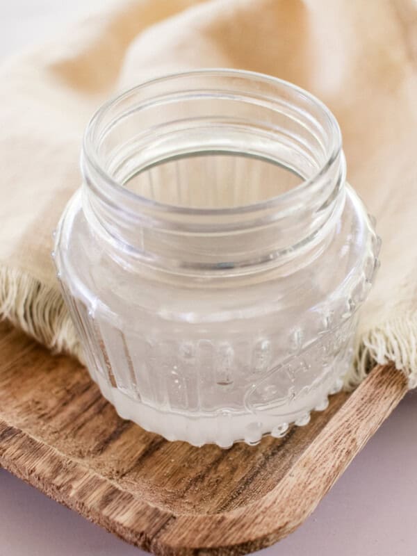A small jar of coconut oil to use for tanning.