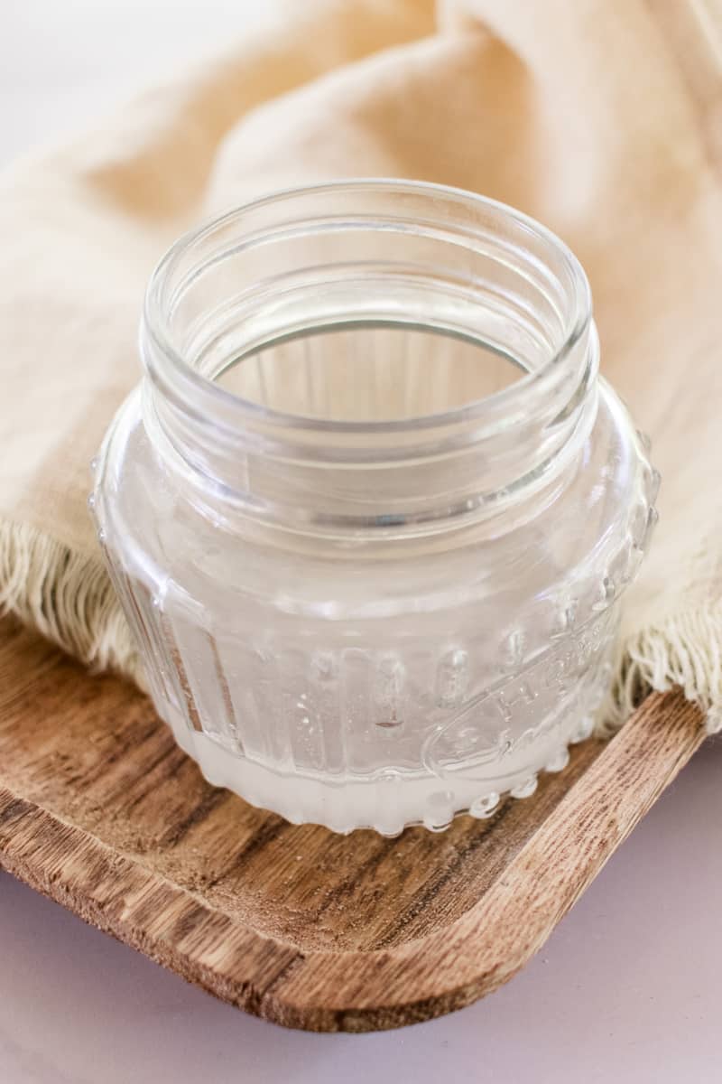 A small jar of coconut oil to use for tanning.