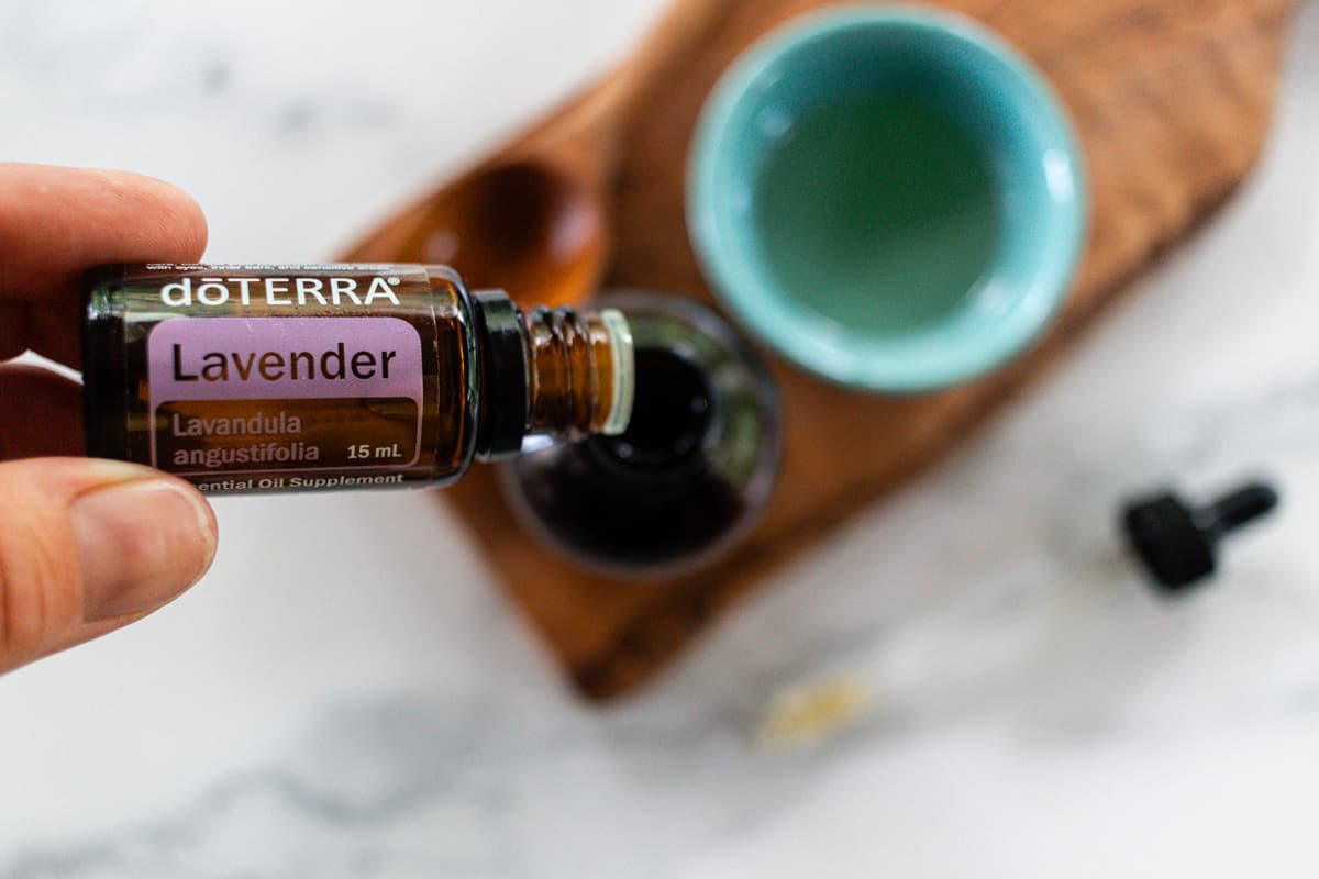 Adding fragrance to a tanning oil that is homemade.