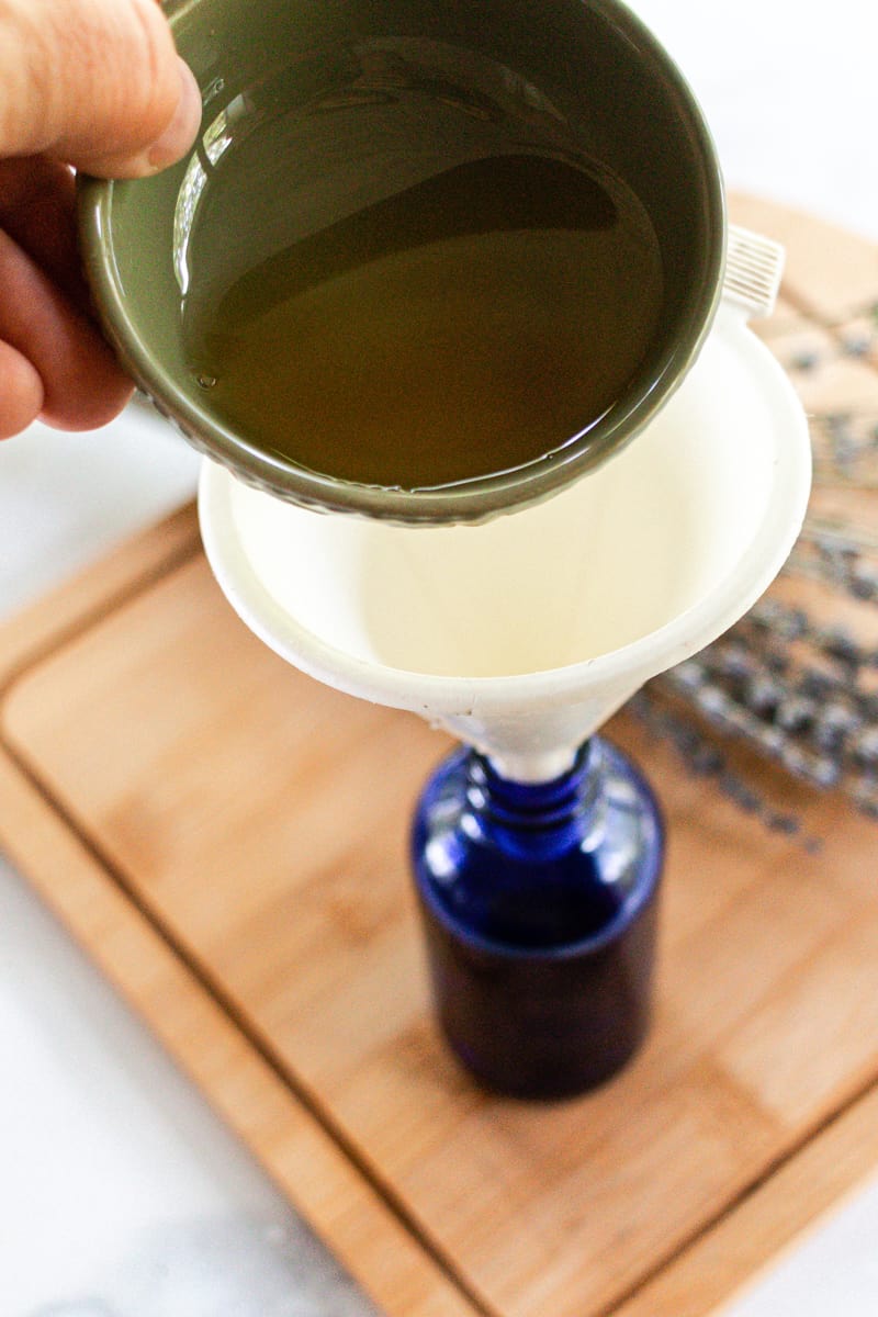 Adding the oils to a hair moisturizer bottle