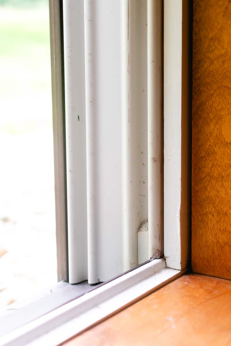 A window sill after the first round of mold spray.