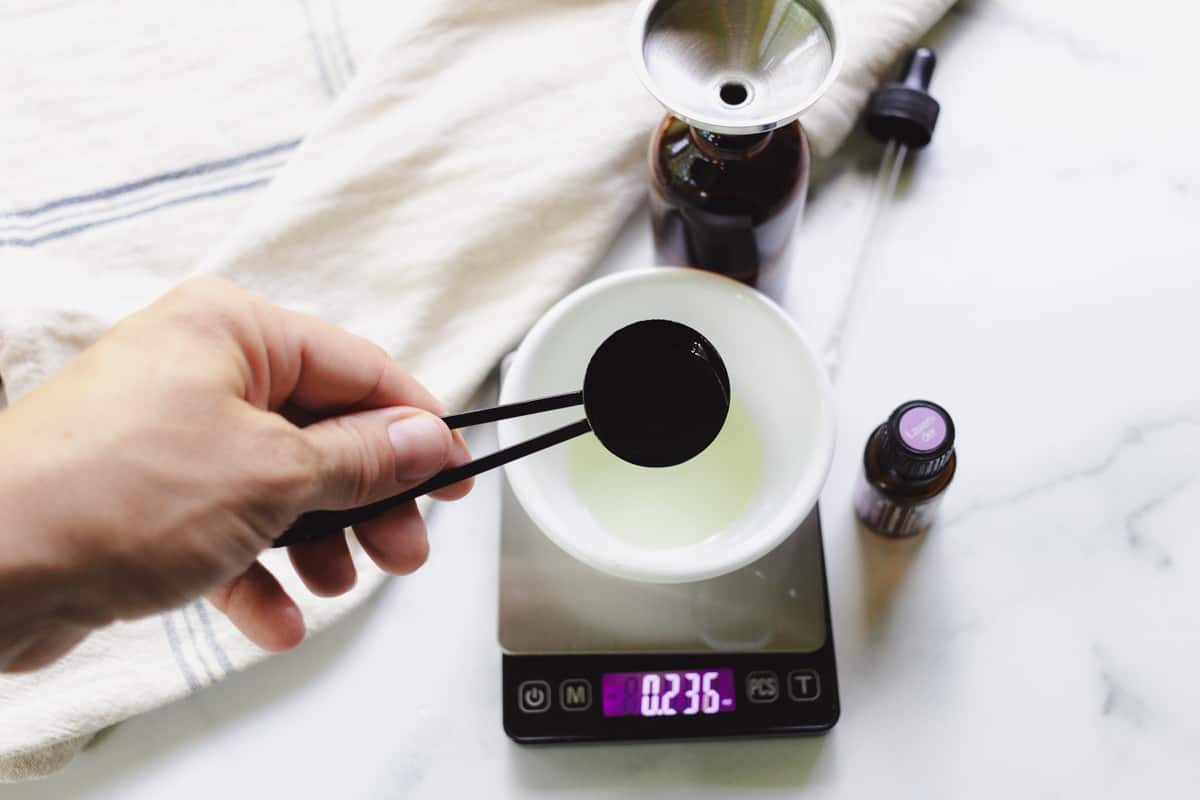 Measuring out the ingredients for the facial oil.